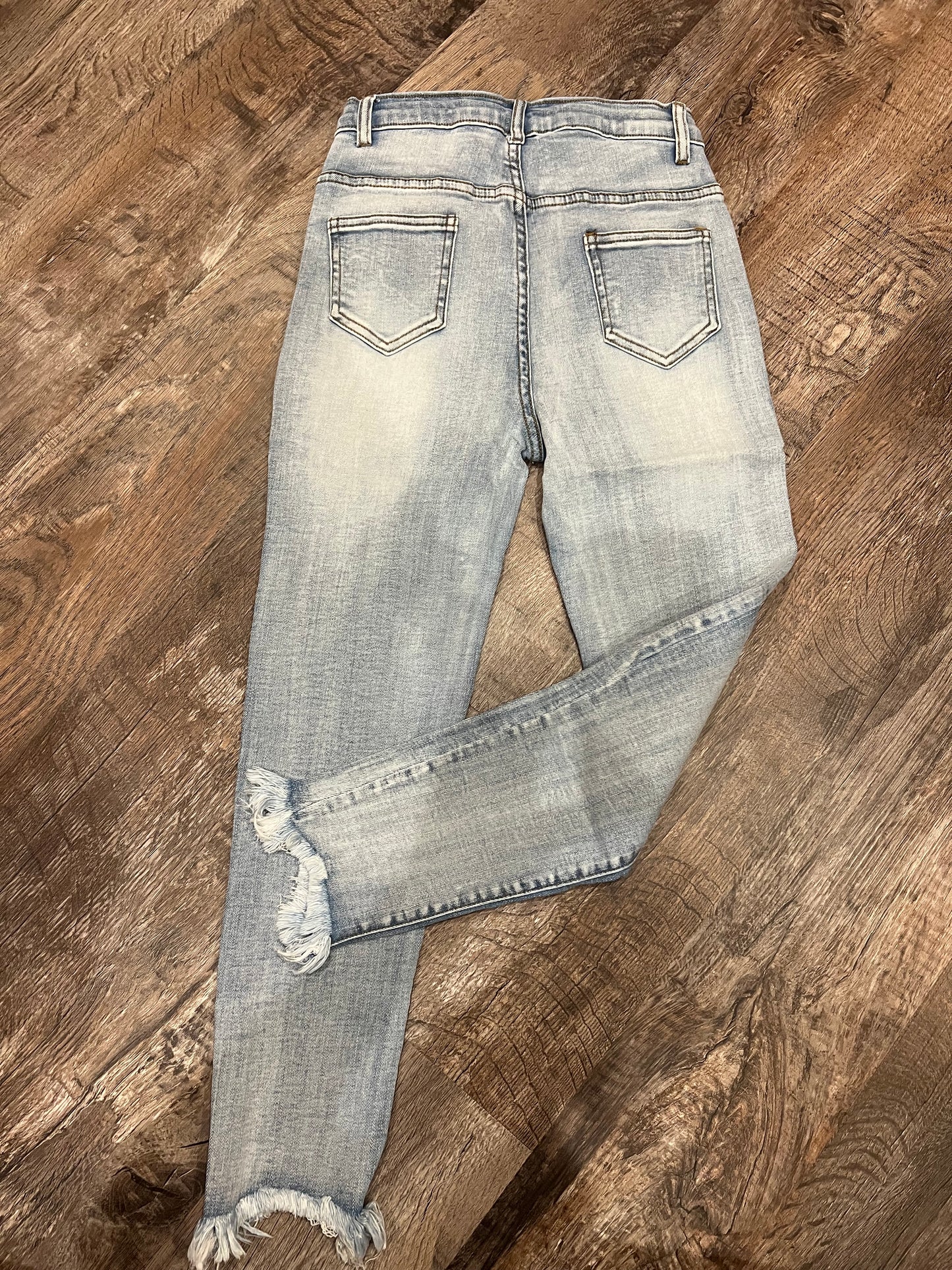 Denim blue jeans with frayed bottom and adjustable waist!