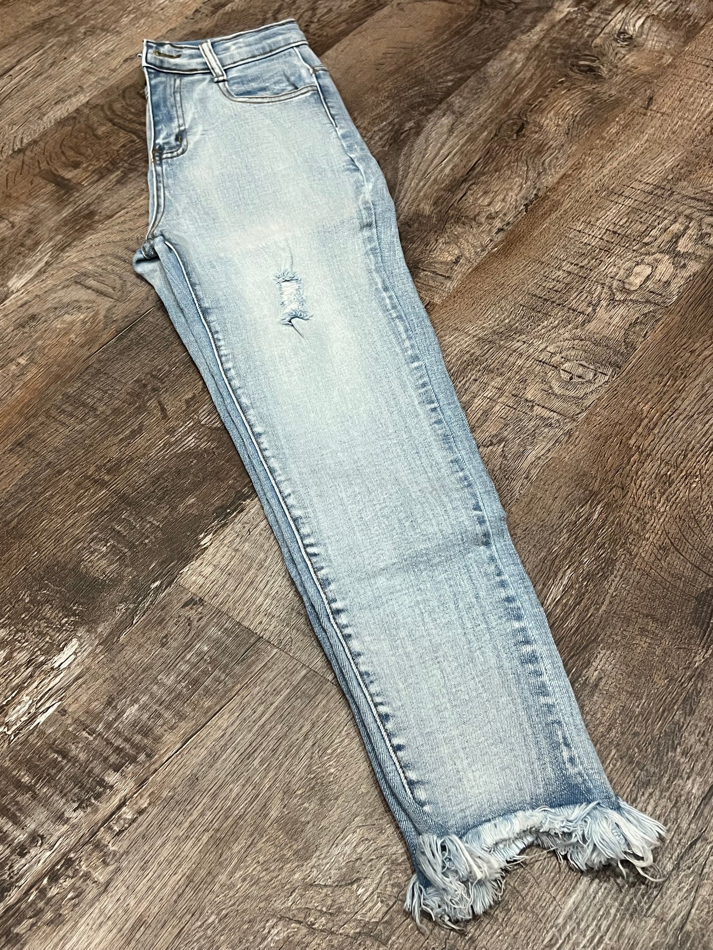 Denim blue jeans with frayed bottom and adjustable waist!